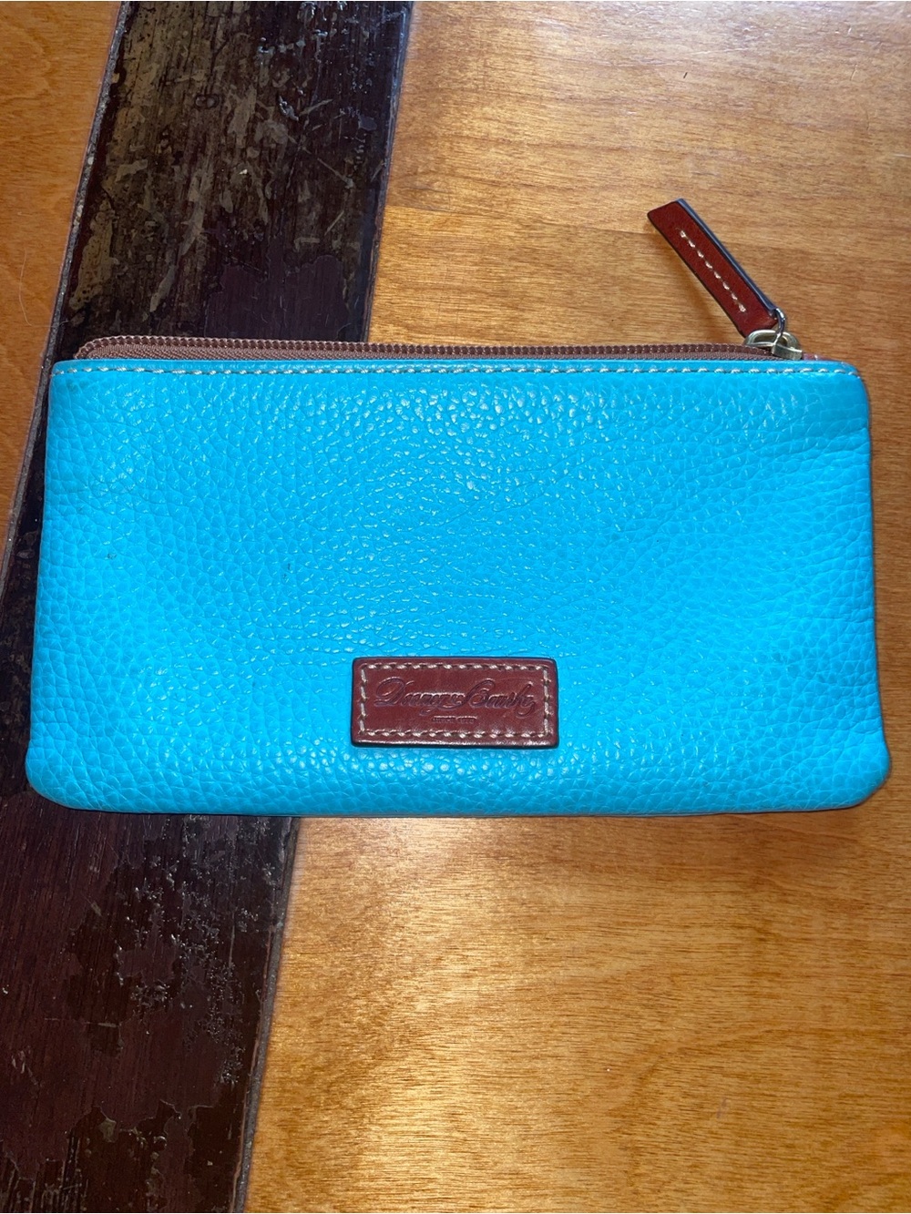 Dooney & Bourke Turquoise Pebbled Leather Zip Wallet with Brown Accent
